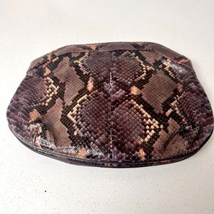 Purple alligator like vintage clutch.